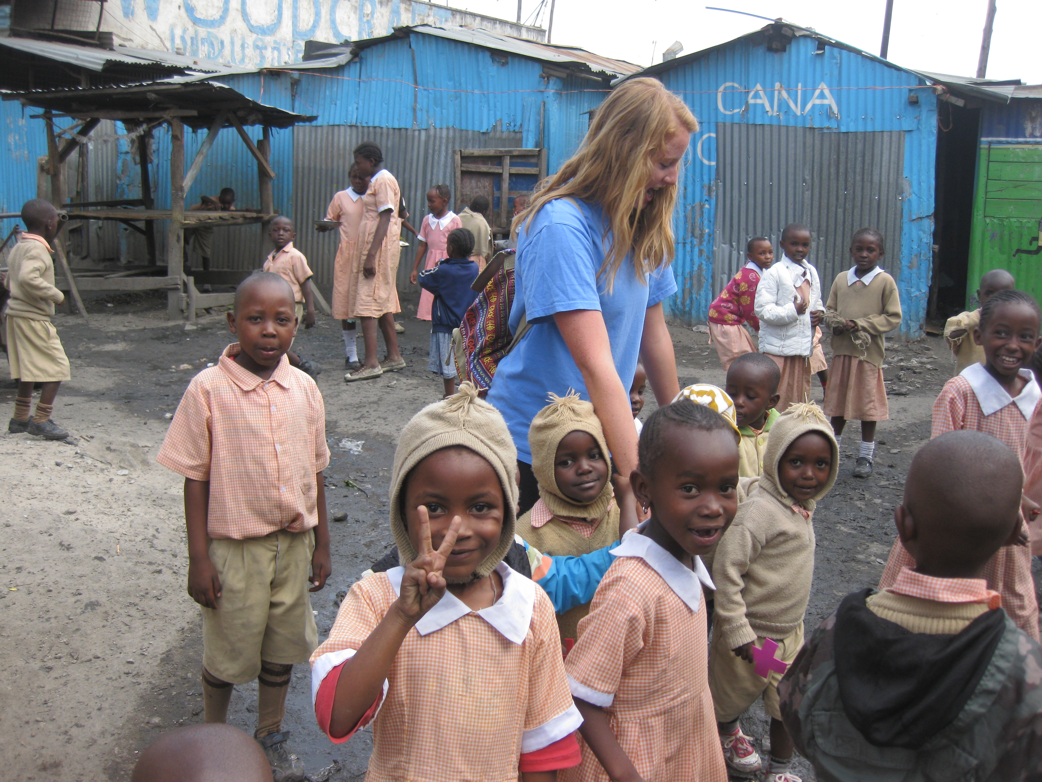 Kylie playing with children at Cana School in the Mukuru slums.